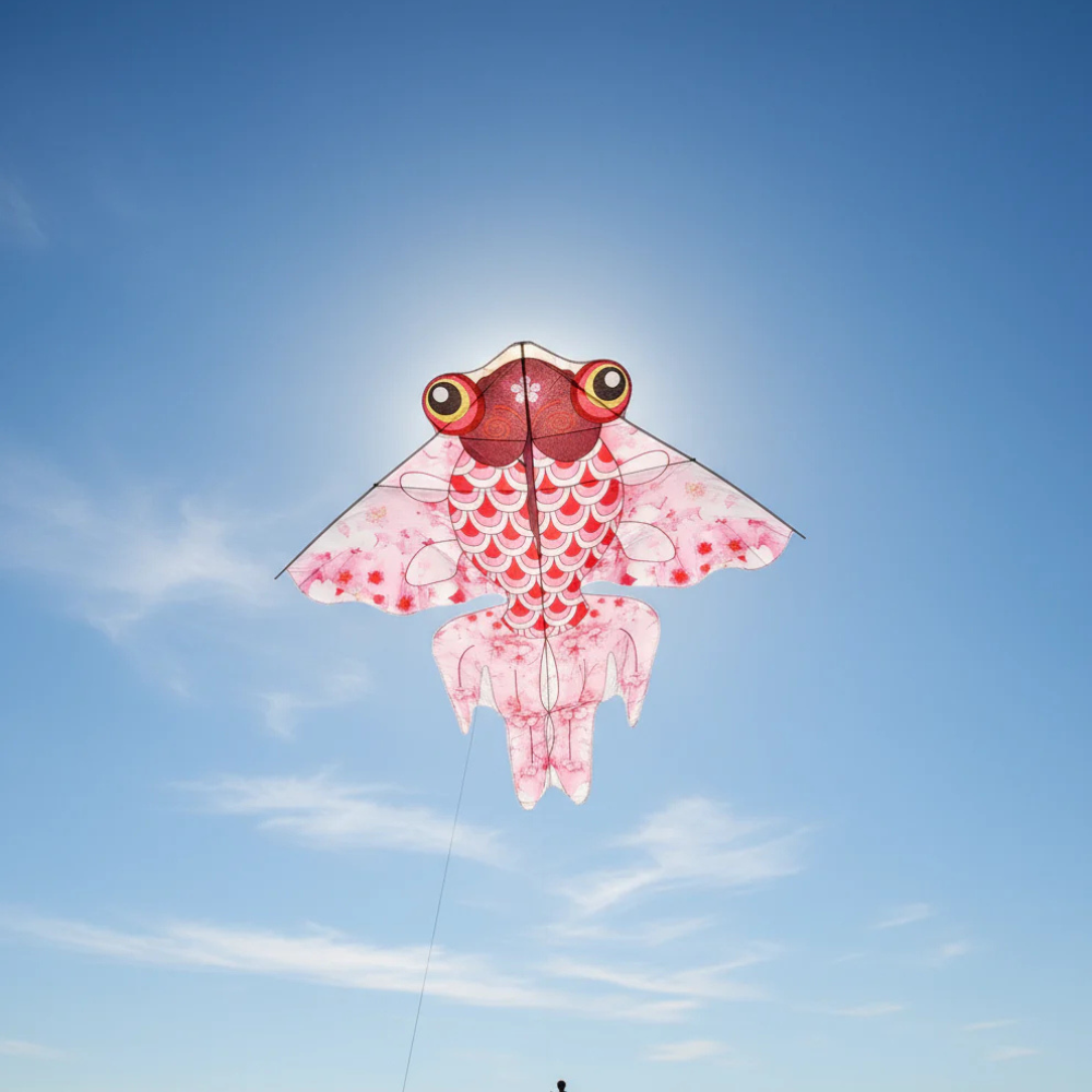 Wikz Hualing Guldfisk Drage i lyserød, flyvende mod blå himmel
