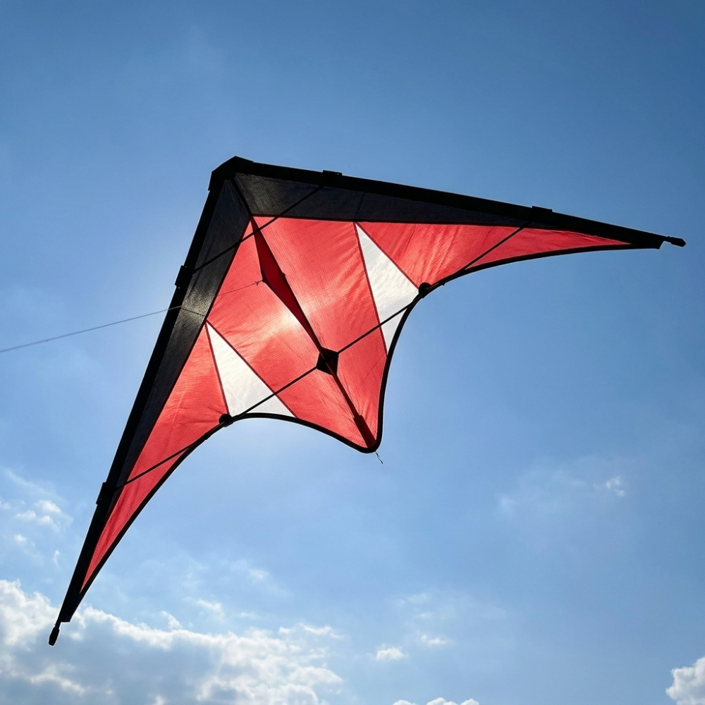 Wikz Delta Core Trickdrage i rød flyver på himlen