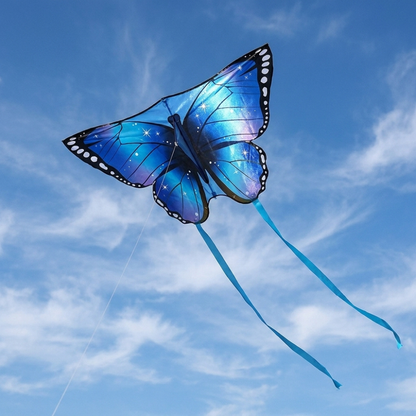Wikz Sommerfugl Pro drage i blå flyver på himlen