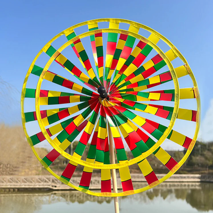 Wikz Twista Colorwheel vindhjul i gul og grøn, vist i natur