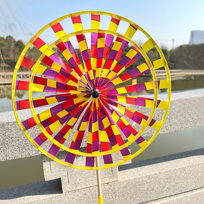 Wikz Twista Colorwheel vindhjul i gul og pink, vist i naturmiljø